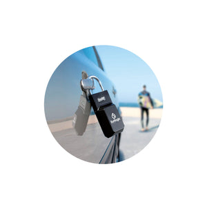 Surflogic Standard Black Key Vault Car Key Security Lock Box Secured on Car Door Handle and Surfer walking with Shortboard to Surf at the Beach
